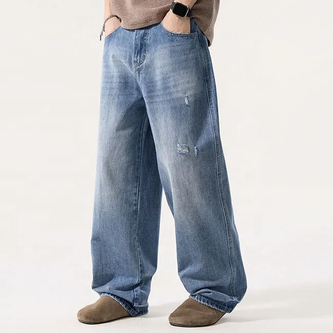 Light Wash Wide Leg Jeans with Distressed Details